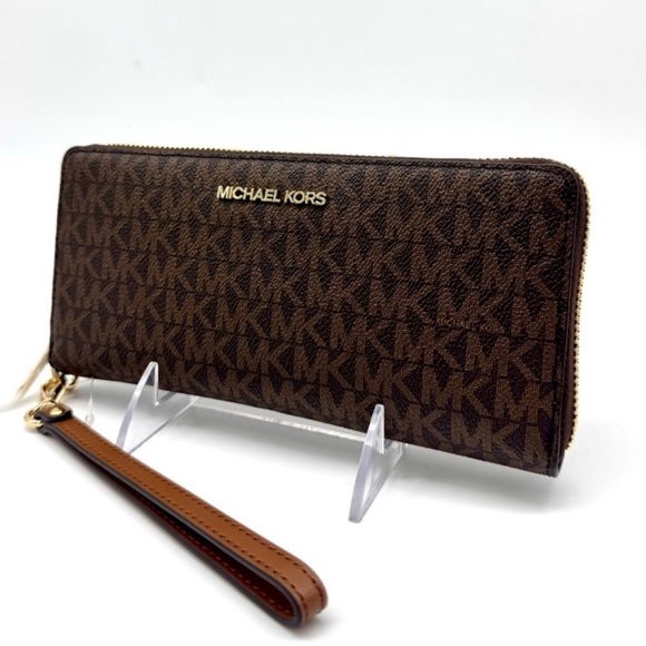 Michael Kors Handbags - Michael Kors Large Jet Set Travel Signature Continental Wallet Wristlet Brown